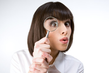 Looking  through a magnifying glass