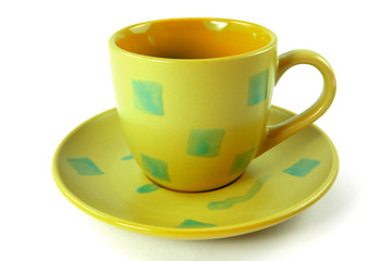 green cup with plate on white background