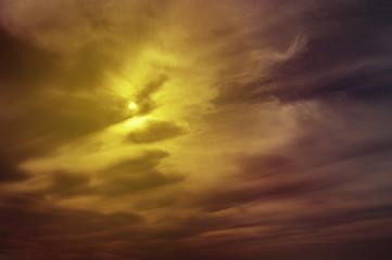sun on storm sky