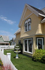 Beautiful old yellow house in summer