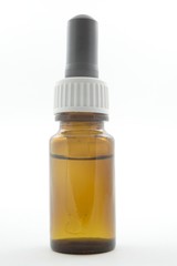 small bottle with a dropper