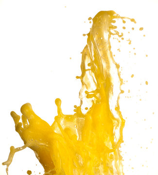 orange juice splashing on a white background
