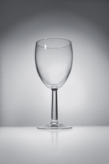 Empty Wine Glass On White Background In Studio
