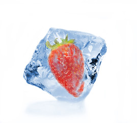 Frozen strawberry in ice cube, isolated on white background