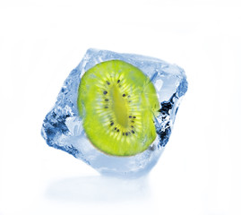 Frozen slice of kiwi in ice cube
