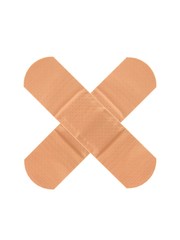 Two crossed adhesive bandages on white background