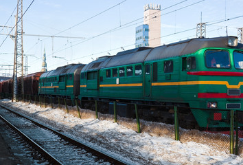 Fototapeta na wymiar Diesel locomotive with cargo