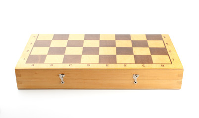 Closeup of an old closed wooden chessboard