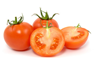 red fresh tomatos over a white background