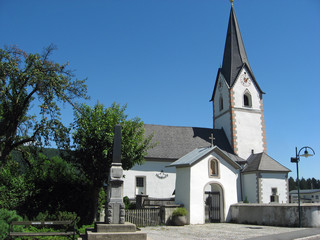Fototapeta na wymiar medieval church in a village