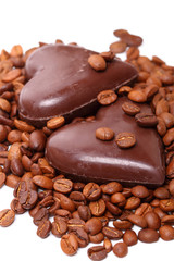 Obraz na płótnie Canvas Coffee beans and chocolate in heart shape
