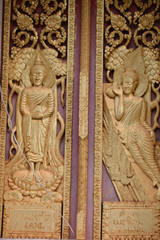 Plakat Temple door in Veintiane, Laos.