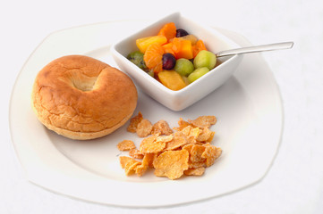 healthy kids lunch with fresh fruits bagel and cereals