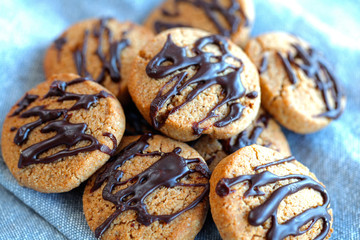 Chocolate cookies serving on a napkin at home