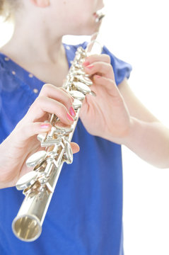 girl playing flute
