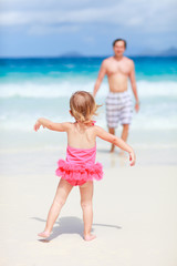 Father and daughter at beach