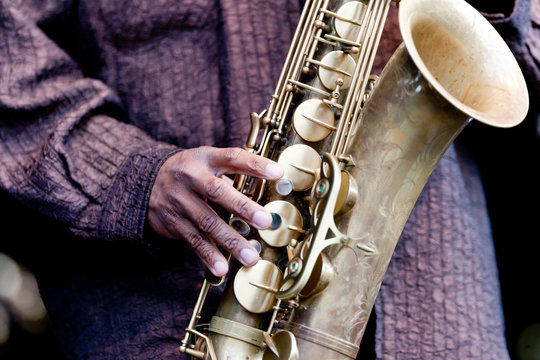 Hand and Saxophone