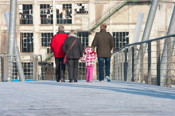 family on footbridge