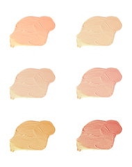 Cosmetic liquid foundation samples isolated on white background