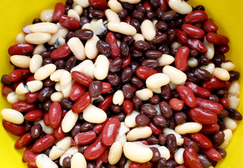 Festive mix of kidney and black beans in colander