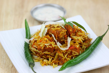 Indian dish chicken biryani made with spices and rice