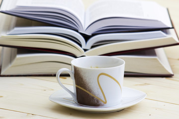 cup of coffee and books