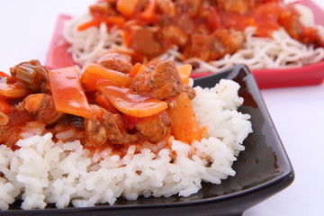 Sweet and sour chicken with rice and chow mein noodles