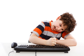 Boy using computer isolated on white background