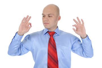 Red and white tablets in male hands