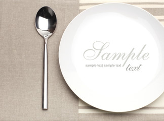 empty plate with spoon