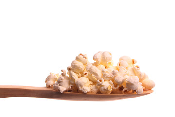 Popcorn on a wooden spoon