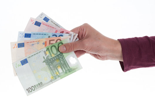 Hand mit Geldscheinen