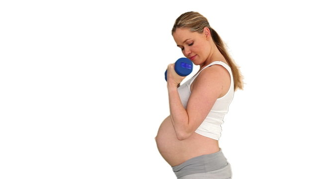 Pregnant woman doing sport bodybuilding
