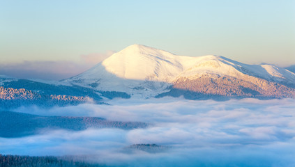 Snowy sunrise mountain  landscape