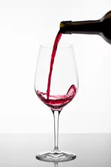 Fotobehang Red wine poured in a glass © Robert Lehmann
