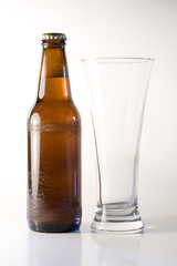 Bottle of beer with glass