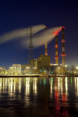 Fototapeta premium Industrial landscape. Heat station and the river.
