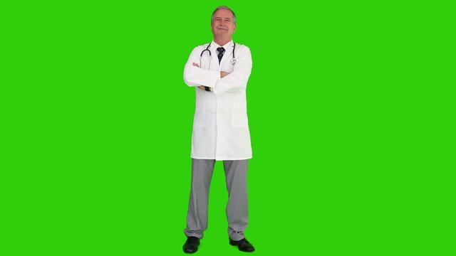 Senior doctor looking at the camera with a stethoscope