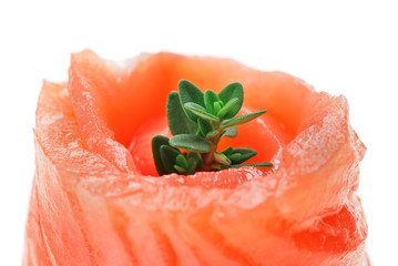 Red salmon roll with thyme twig