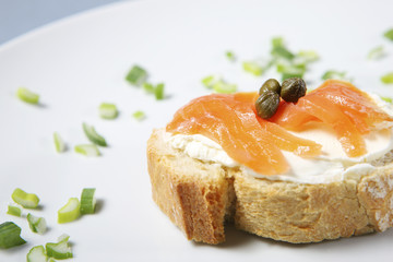 Sandwich with salmon and capparis