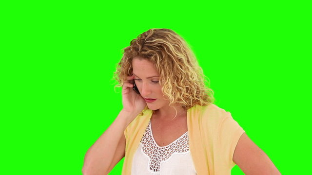 Woman having a phone call and it's making her nervous