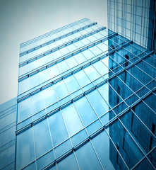 modern glass silhouettes of skyscrapers at night