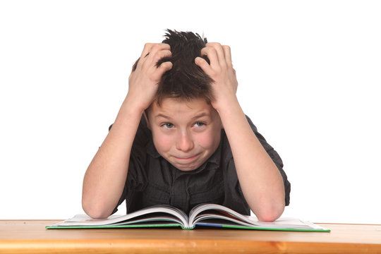 young boy learning