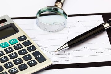 financial charts and graphs on the table