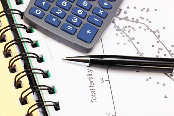 financial charts and graphs on the table