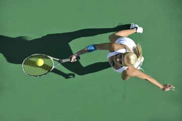 Foto op Canvas young woman play tennis outdoor © .shock