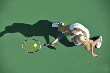 Foto op Canvas young woman play tennis outdoor © .shock