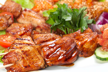 barbecue with sauce and vegetables
