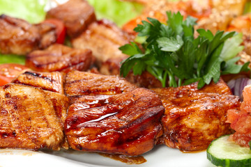 barbecue with sauce and vegetables