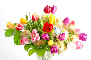 Multicolor fresh spring tulips with easter eggs